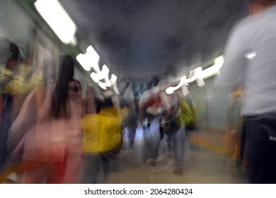 Slow Shutter Speed Image Giving The Sense Of Fast Movement And The Busy Nature Of People