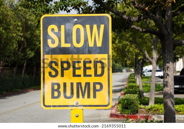 Slow speed bump road\
sign