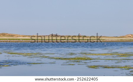 Similar – Lahnungen coastline barge