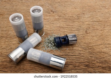 Slug Shotgun Shell Cartridge On Wooden Background