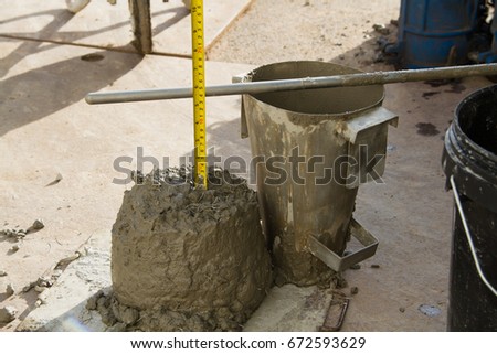 Slump test of concrete mixer by consultant engineer before approve to laying concrete construction,