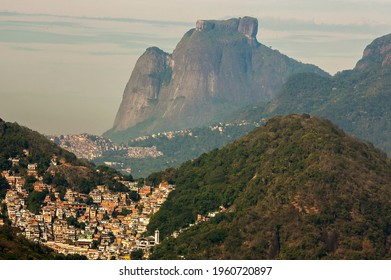 Slums In The Hills And Pedra Da Gávea In The Background