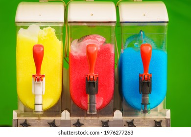 Slush machine. Slushy ice made colorful drink refreshing during summer. Granita distributor. Different flavors.