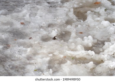 Slush And Trampled Snow With Water.