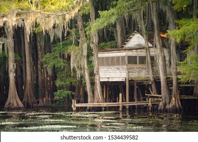 Small abandoned house over the swamp at Caddo Lake near Uncertain, Texas