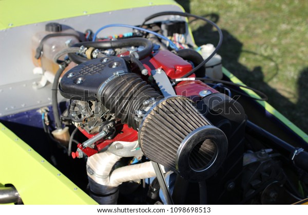 A\
small air filter engine is a self-made sports\
car.