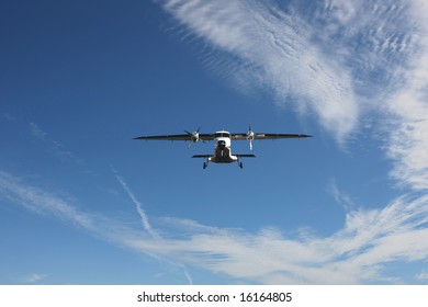 Small Airplain In A Blue Sky