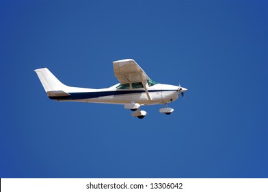 Small Airplane Against Blue Sky