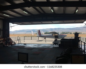 Small Airplane Hanger With A Tiny Two Passenger Plane Getting Ready To Go Skydiving In Nephi, UT.