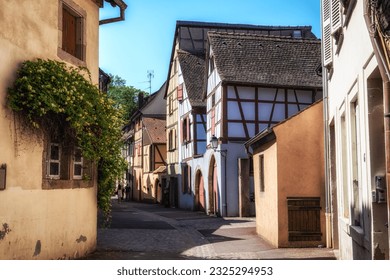 Small alleyway with Alsatian half timbered houses built along. Taken in Colmar, France