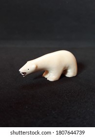 Small antique Polar Bear Ivory carving by Inuit. Handmade by the Native People of Canada.