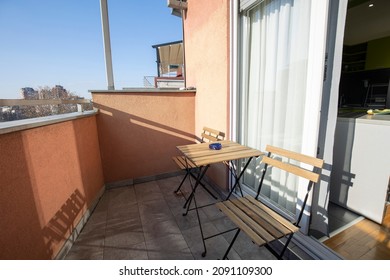 Small Apartment Terrace With Table And Chairs