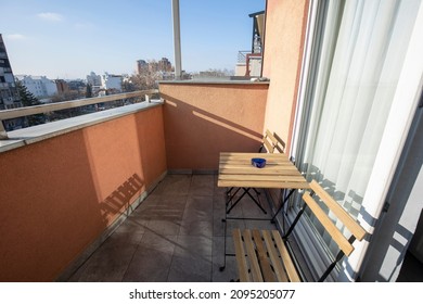 Small Apartment Terrace With Table And Chairs