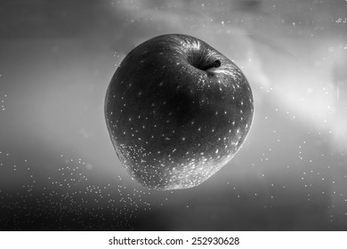 Small apple in see trough water closeup - Powered by Shutterstock