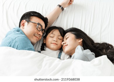 
small asian family portrait at home - Powered by Shutterstock