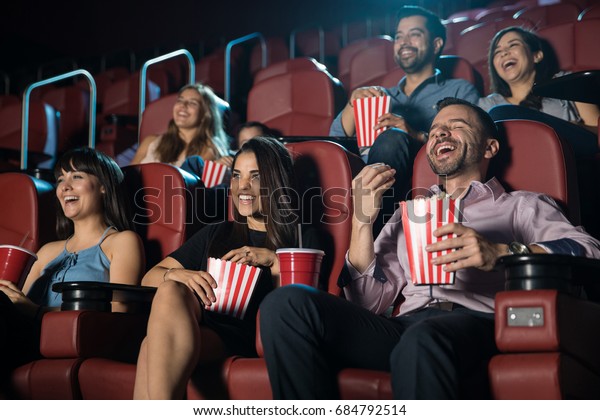 small-audience-people-laughing-movie-600w-684792514.jpg