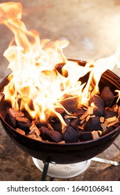 A Small Barbecue Grill On Fire, Being Prepared For A Cook Out.