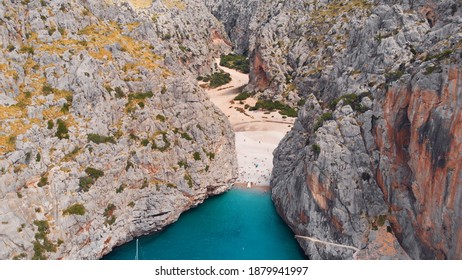 Small beach of Mediterranean sea, between cliffs, Sa Calobra, Torrent De Pareis beach,Serra De Tramuntana, Mallorca, Spain. High quality photo