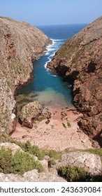 Small beach within cliffs horizontal