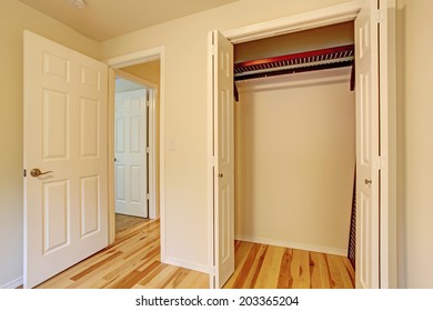 Small Bedroom Interior. CLose Up View Of Empty Closet