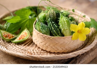 Small Bitter Gourd Or Bitter Melon In Bamboo Basket, Food Ingredients And Herbal Medicine