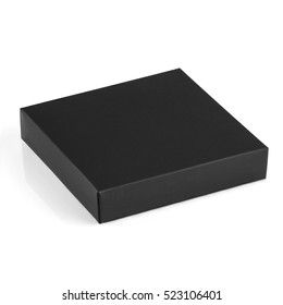 Small Black Cardboard Box Mockup Isolated On White Background With Mirror Reflection. Isometric View From Above The Table Surface