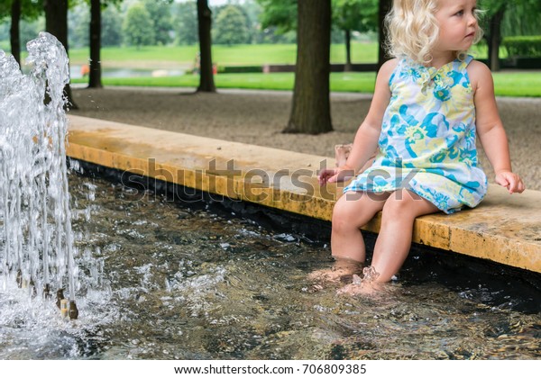 Small Blonde Girl Dipping Her Feet Stock Photo 706809385 | Shutterstock