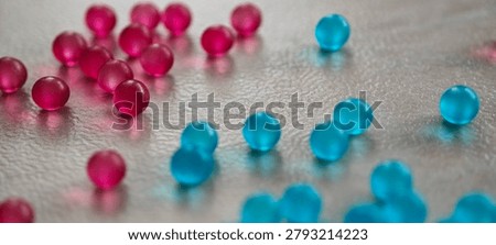 Small blue 3D round particles left undisturbed on the countertop