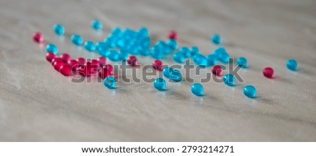 Small blue 3D round particles left undisturbed on the countertop