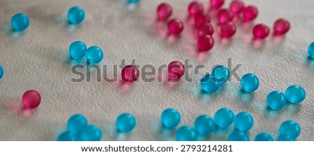 Small blue 3D round particles left undisturbed on the countertop