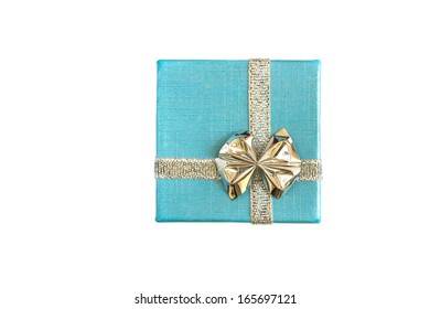 Small Blue Gift Box With A Bow Tie Isolated On White.