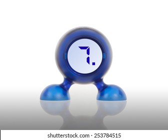 Small blue plastic object with a digital display, displaying 7