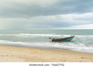 Small Boat Alone Ocean Beachfront Morning  Storm Danger