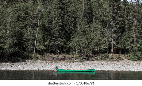 Small Boat On The River (Bonaventure) Surrounded By The Forest In Gaspé Peninsula , Quebec 