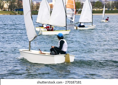 Small boats sailing on the lake on a beautiful sunny day