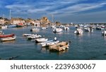 Small boats and ships in the port of Barfleur, a commune in the peninsula of Cotentin in the Manche department in Lower Normandy in north-western France