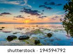 Small boulders frame sunset in Key Largo, FL