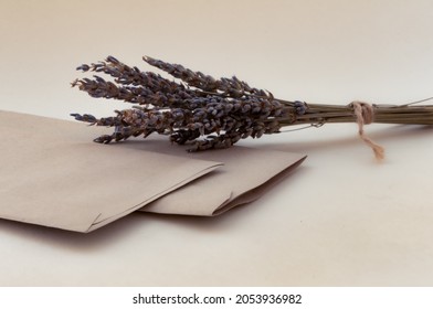 Small Bouquet Of Dry Lavender On Brown Envelope In Vintage Style. Concept Of Old Day, Memory Of Love.