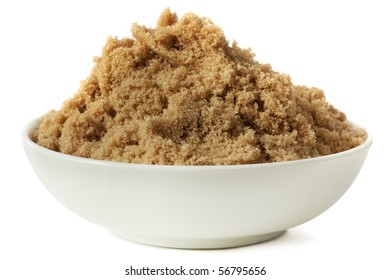 Small Bowl Of Brown Sugar, Isolated On White.