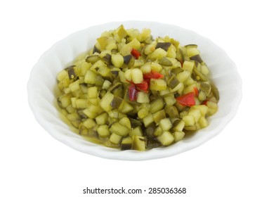 A Small Bowl Of Delicatessen Style Sweet Relish Isolated On A White Background.