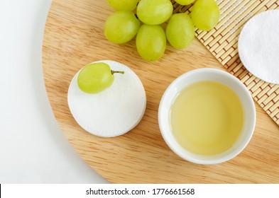 Small Bowl With Grape Seed Oil (grape Juice, Vinegar), Cotton Pads. Ingredients For Preparing Homemade Hair Mask, Face Toner. Natural Beauty Treatment Recipe, Zero Waste Concept. Top View, Copy Space