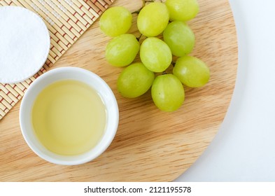 Small Bowl With Grape Seed Oil (grape Juice, Vinegar). Ingredients For Preparing Homemade Hair Mask, Face Toner. Natural Beauty Treatment Recipe, Zero Waste Concept. Top View, Copy Space