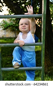 Small Boy Climbing Ladder