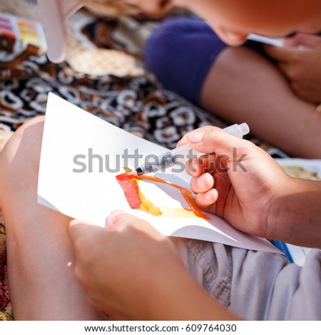 Similar – Image, Stock Photo Young friends looking map with healthy drinks and snacks