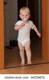 Small Boy Running Around In House