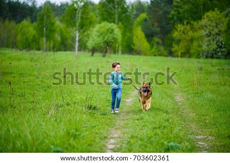 Similar – Attractive smiling blond woman with her two dogs