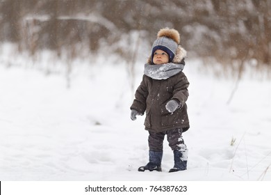 small boy in winter park