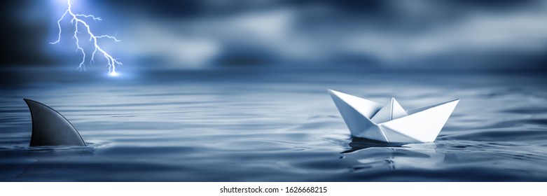 Small Brave Paper Boat In Stormy Ocean With Sharks And Lightning - Risk/Courage Concept 