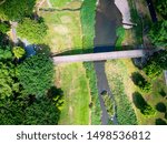 small bridge over a stream viewed from above