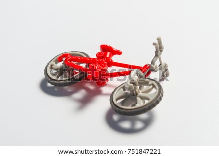 Small broken toy bicycle 